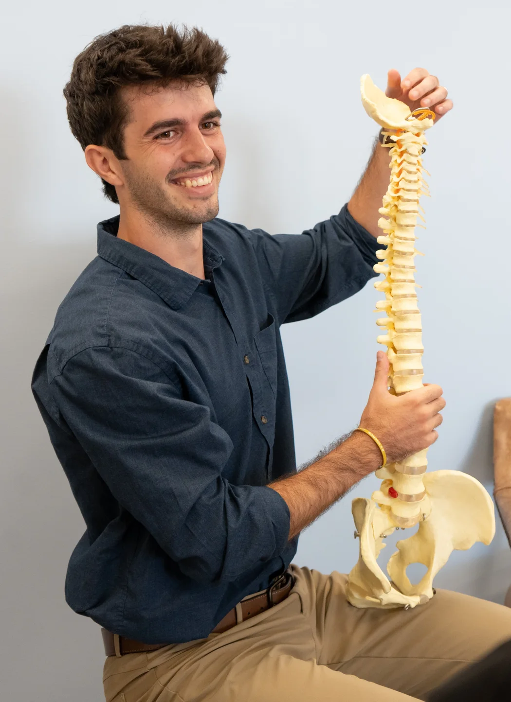 Atnip Chiropractic — using a full spine model to explain disc and vertebral alignment in Owensboro